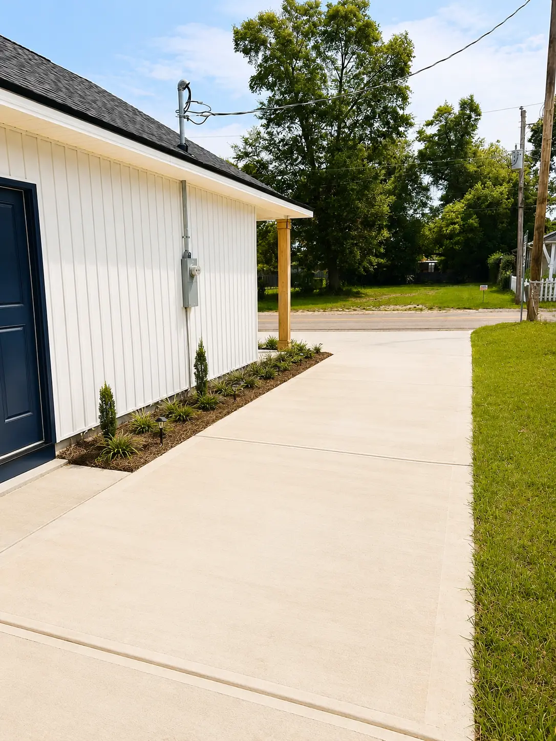 Wide private driveway and walkway alongside the home